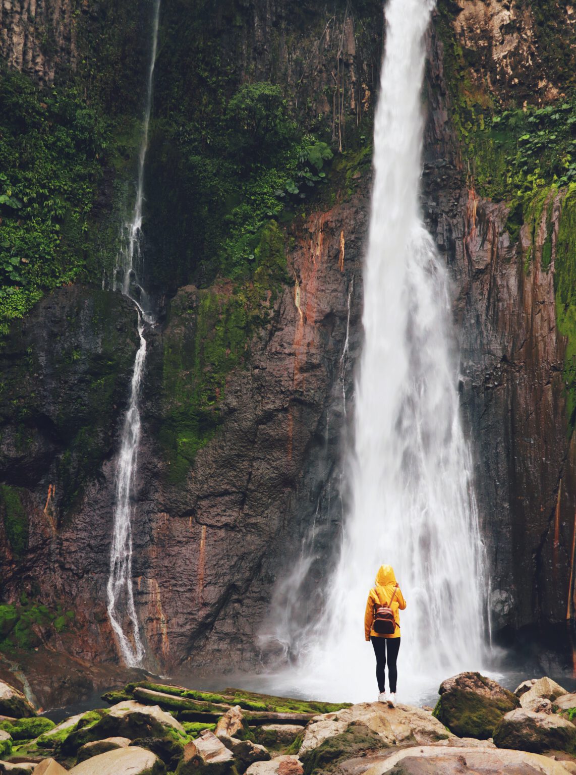 Waterfall in Costa Rica named Catarata-deltoro + person in front